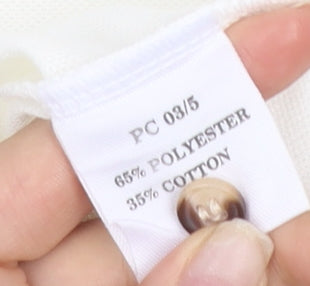 Brand and care label for Blue Max unisex white polo shirt xl classic