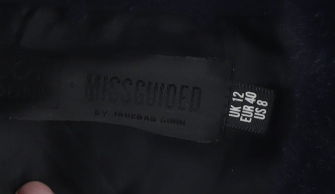 Close-up detail of Missguided Women's Black Puffer Jacket, size 12, Faux Leather