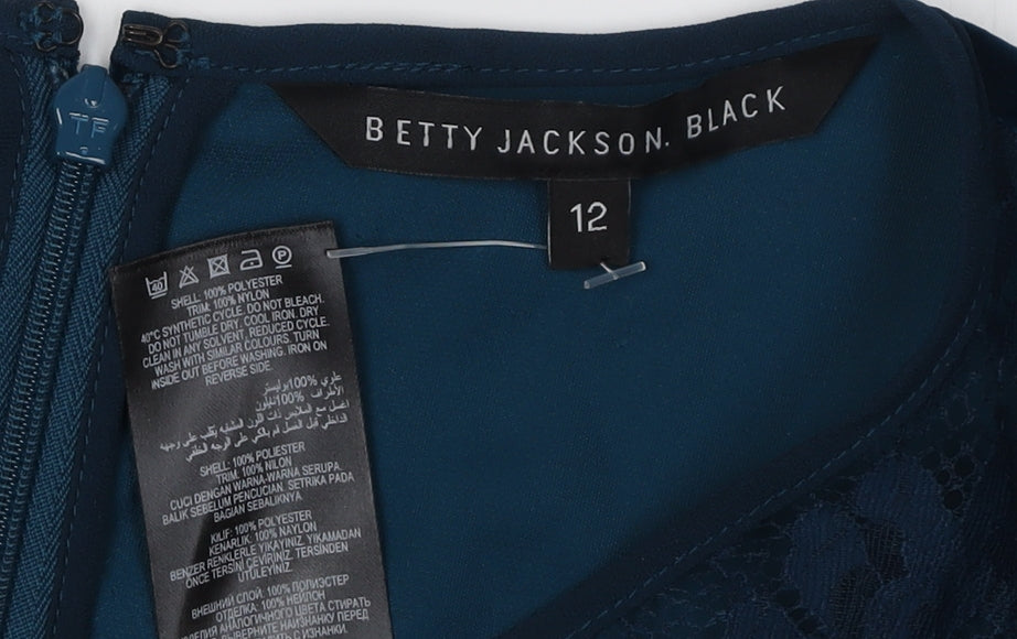 Close-up detail of Betty Jackson Black Women's Blue Velvet Blouse, size 12
