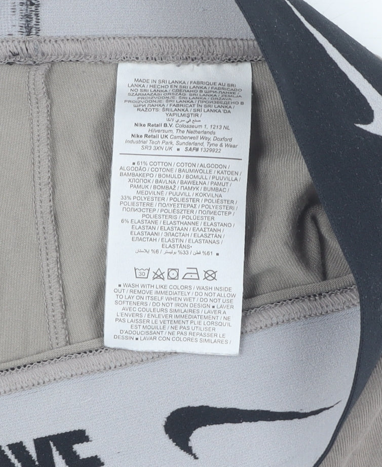 Brand and care label for Nike unisex grey compression leggings m - gym training fit