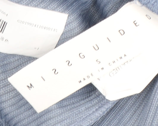 Close-up detail of Missguided Women's Blue Wide-Leg Corduroy Trousers, size S
