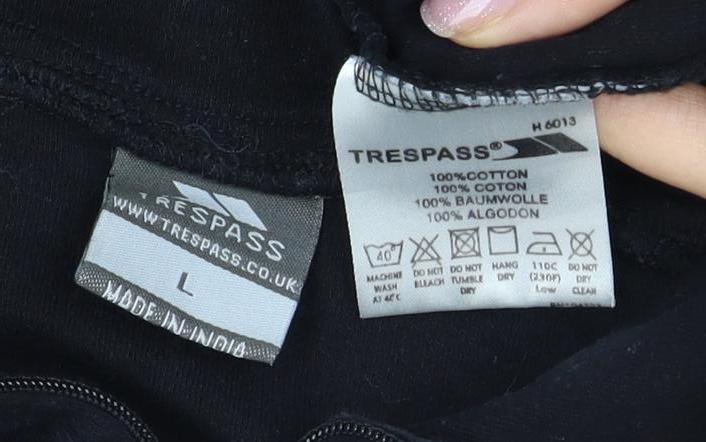 Close-up detail of Trespass Black unisex l full zip sweatshirt