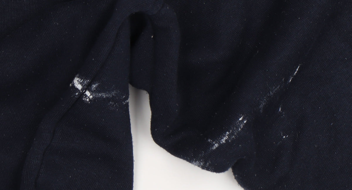 Brand and care label for Uneek Black Hoodie, unisex, size S, pullover style