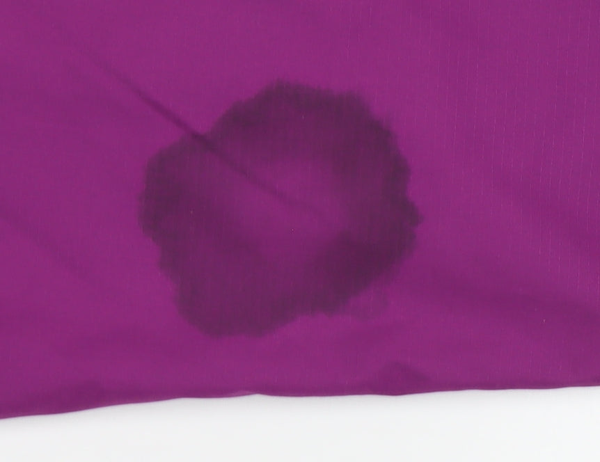 Brand and care label for Decathlon Teens Purple Waterproof Rain Jacket, size 12