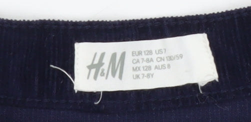 Brand and care label for H&M Teens Blue A-Line Corduroy Skirt, size 12