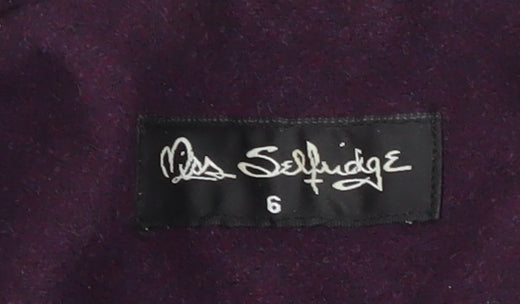 Brand and care label for Miss Selfridge Women's Purple Buckle Coat, size 6