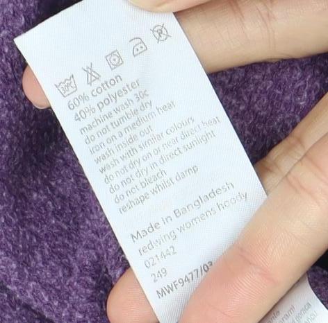 Brand and care label for Mountain Warehouse unisex purple hoodie, size 12