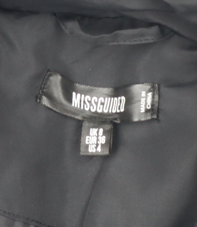 Brand and care label for Missguided Women's Black Padded Waistcoat UK 8