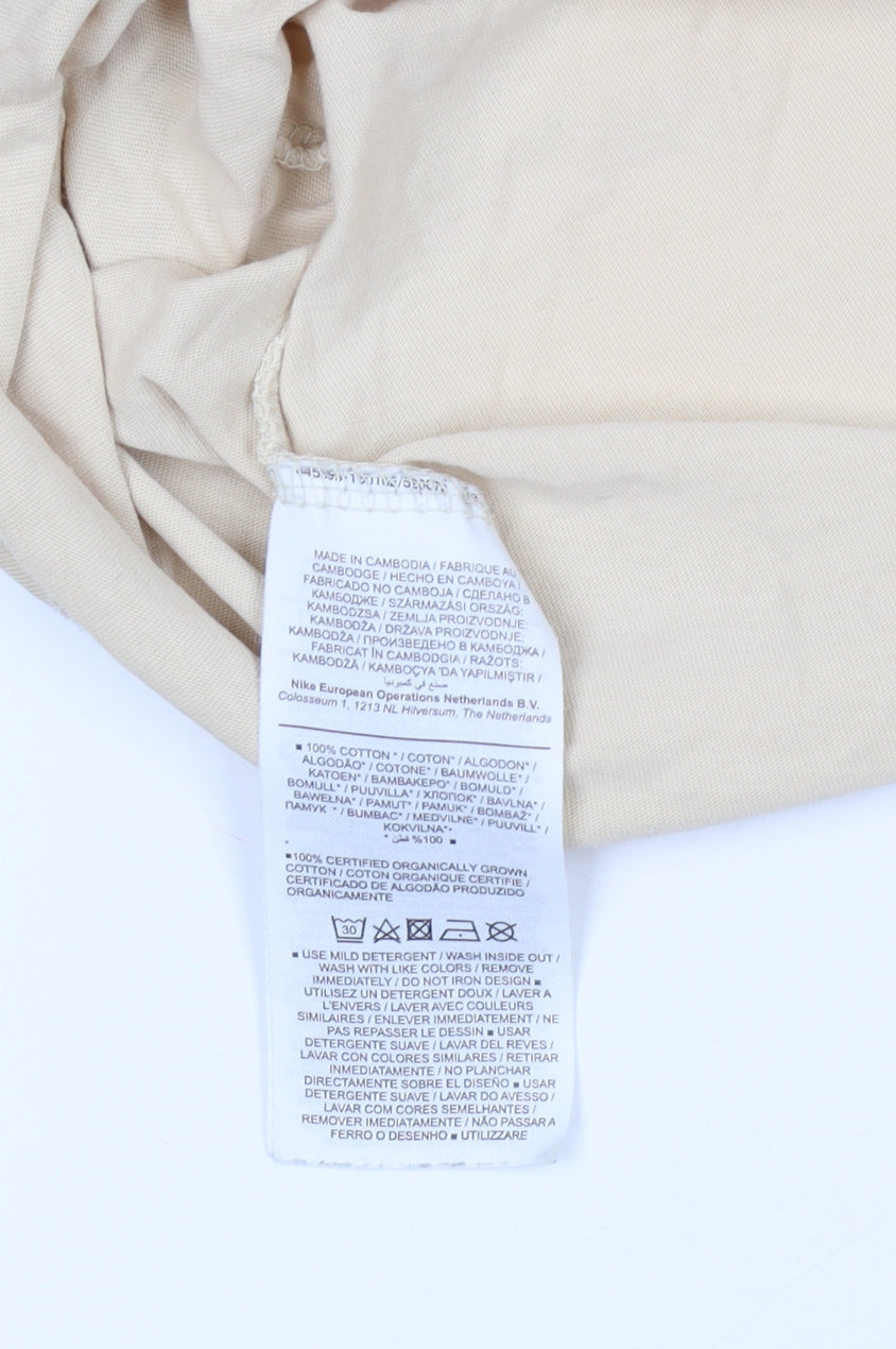 Brand and care label for Nike unisex beige m t-shirt casual short sleeve