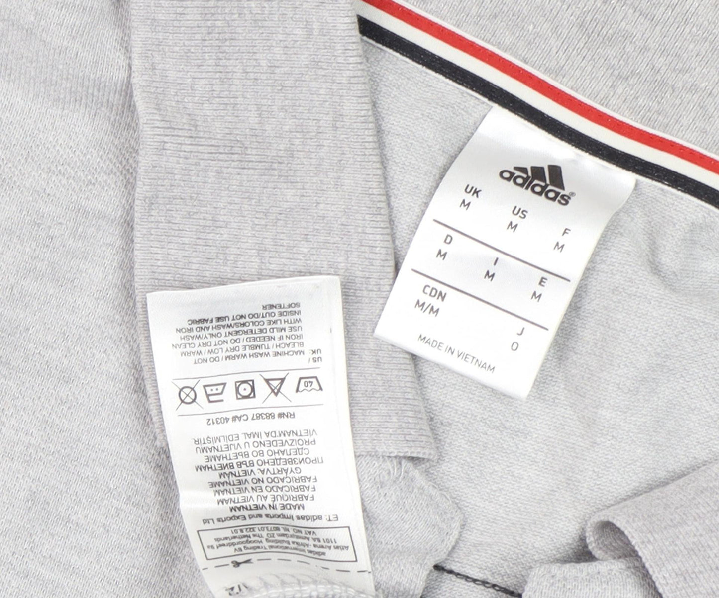 Close-up detail of Adidas Men's Grey Polo Shirt M Regular Fit Football