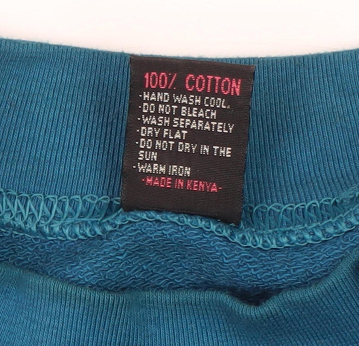 Brand and care label for Dash unisex adults blue pullover sweatshirt, size 18