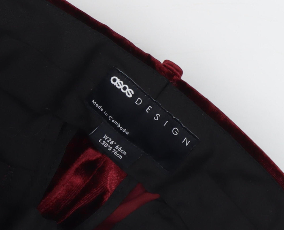 Close-up detail of ASOS DESIGN Women's Red Velvet Trousers, size 8, Party Ready