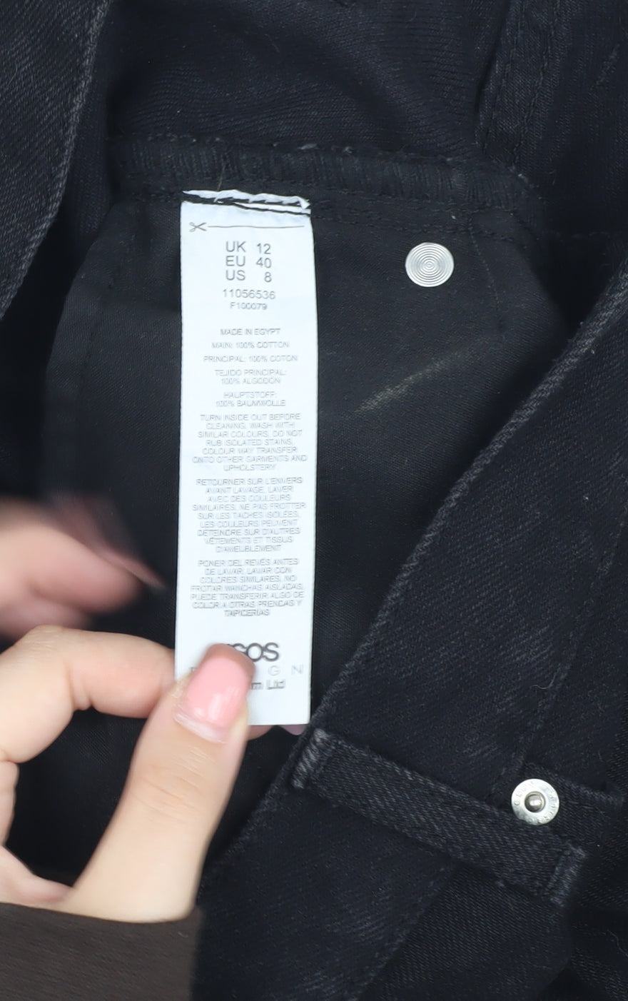 Brand and care label for ASOS Women's Black Cotton Short Skirt, size 12