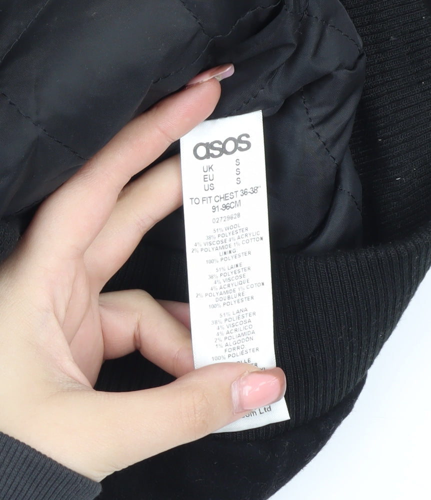 Brand and care label for ASOS unisex black wool bomber jacket, size S, full zip