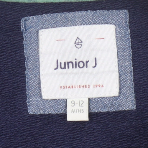Brand and care label for Junior J unisex baby blue basic jacket 9-12 months