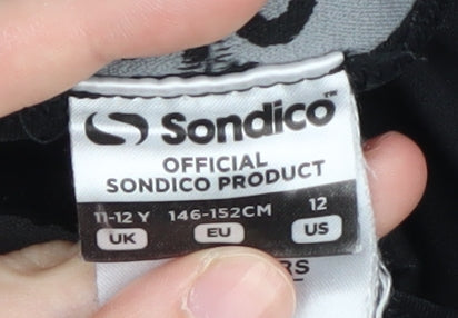 Brand and care label for Sondico unisex kids black compression trousers 11-12 years