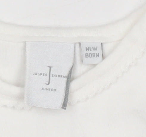 Brand and care label for Jasper Conran White Newborn unisex babygrow