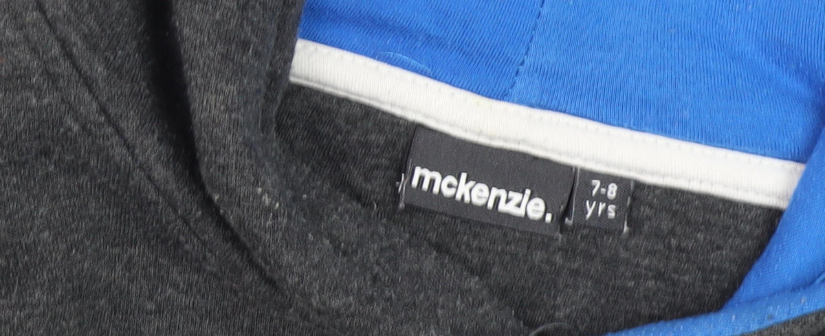 Close-up detail of McKenzie boys’ grey pullover hoodie 7-8 years, logo accent