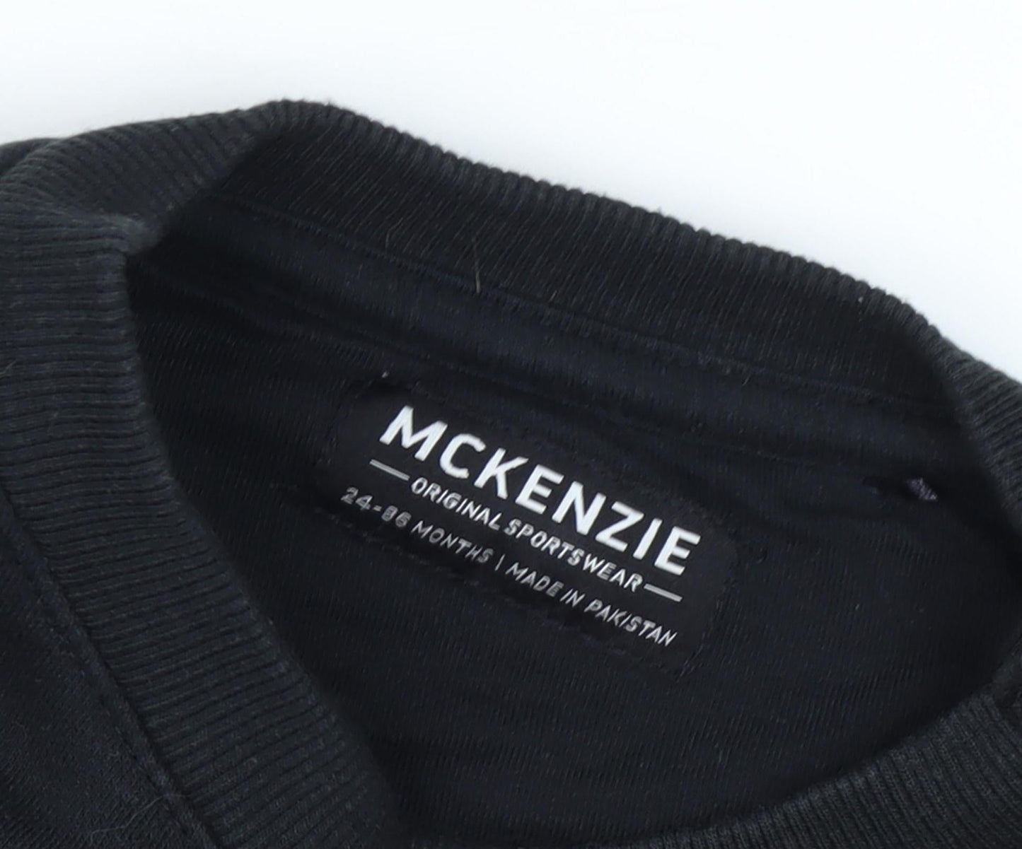 Close-up detail of McKenzie boys’ black pullover sweatshirt -, size 2, years