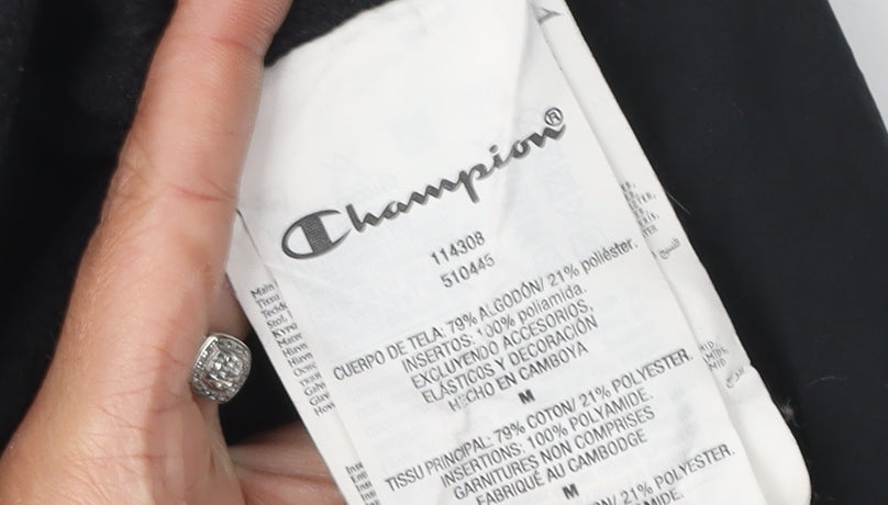 Close-up detail of Champion unisex black sweatshirt m, mock neck, logo