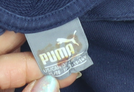 Close-up detail of Puma boys’ blue pullover hoodie, size 14-16, logo sportswear