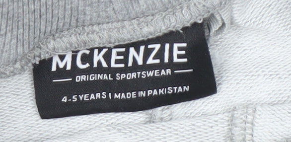 Brand and care label for McKenzie boys’ grey athletic shorts 4-5 years