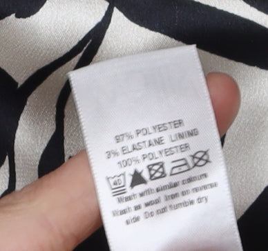 Brand and care label for Wallis Women's Black & White Floral Dress, size 10