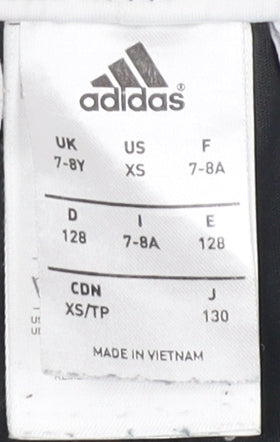 Close-up detail of Adidas boys’ black football shorts 7-8 years athletic style
