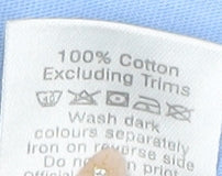 Brand and care label for Manchester City Women's Blue Ringer T-Shirt, size 12