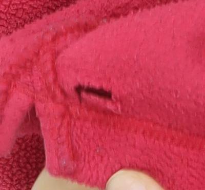 Brand and care label for Columbia Red unisex fleece pullover sweatshirt, size 16