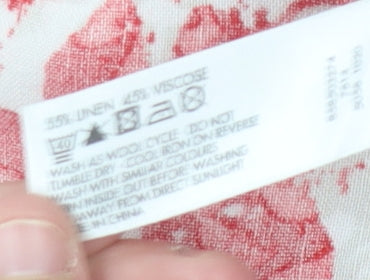 Brand and care label for Maine New England Women's Floral A-Line Skirt, size 12