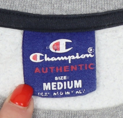 Close-up detail of Champion unisex grey pullover sweatshirt, size M