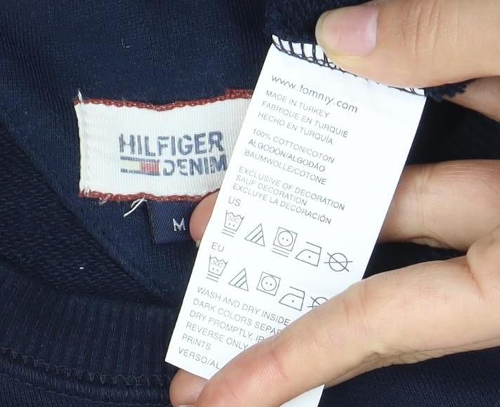 Close-up detail of Tommy Hilfiger unisex blue pullover sweatshirt m