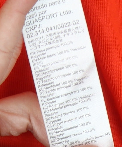 Brand and care label for Decathlon unisex orange long sleeve activewear top