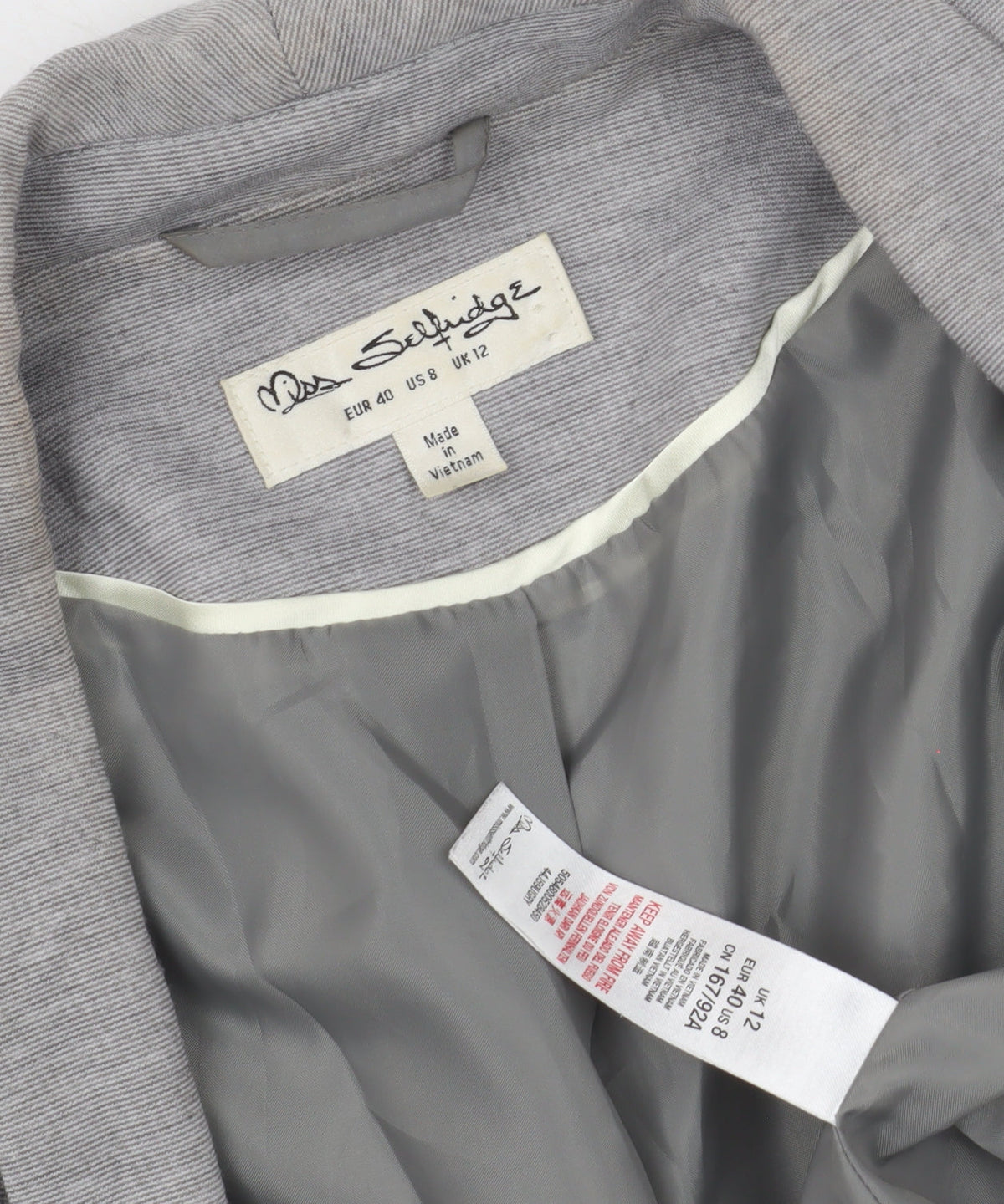 Close-up detail of Miss Selfridge Women's Grey Blazer UK 12 Regular