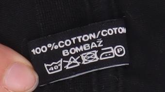 Brand and care label for Donnay unisex black cotton crew neck t-shirt