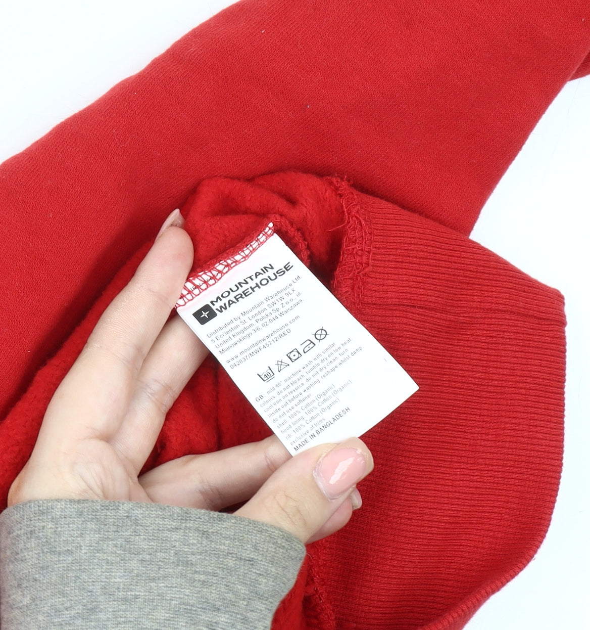 Brand and care label for Mountain Warehouse unisex red hoodie, size 12