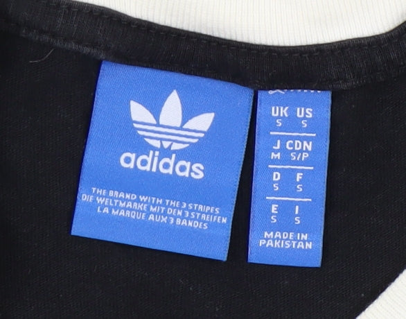 Close-up detail of Adidas unisex black ringer t-shirt, size S, stylish and casual