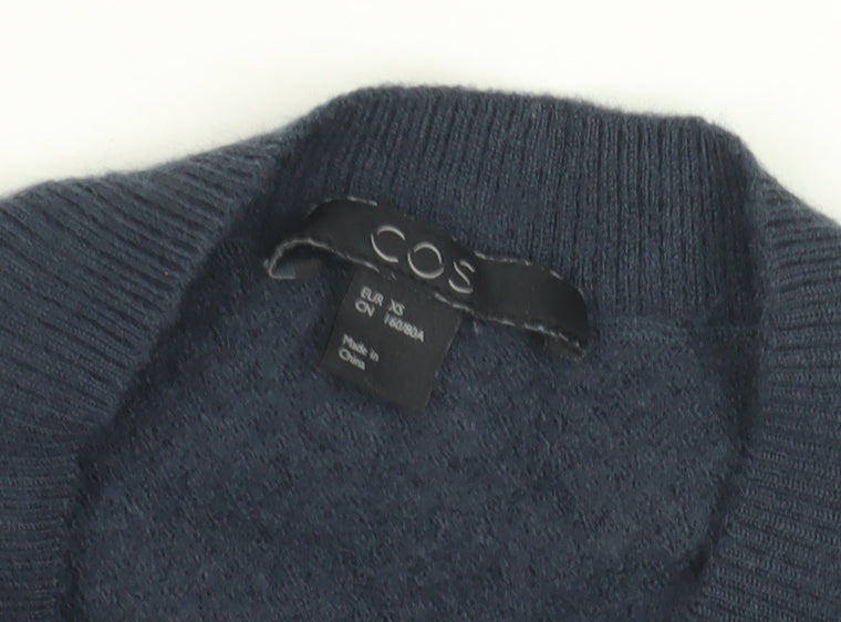 Close-up detail of COS unisex kids blue wool jumper xs