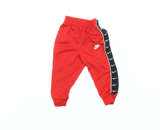 Additional front view of Nike unisex baby red jogger trousers, 12 months, casual play