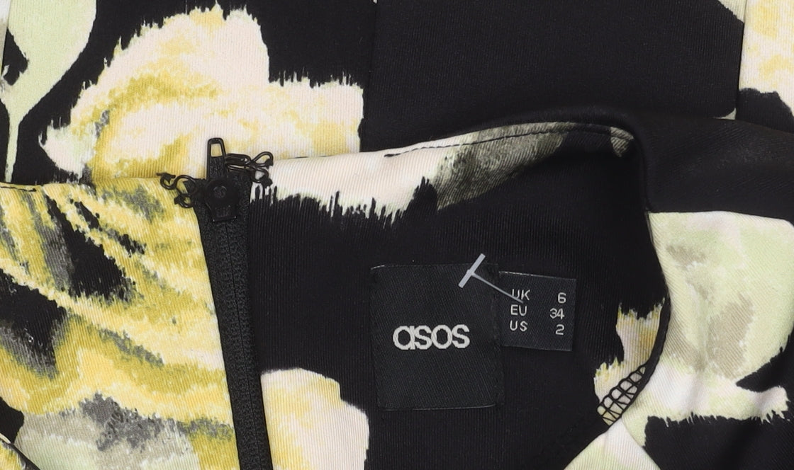 Brand and care label for ASOS Women's Black Floral Top, size 6, Short Sleeve
