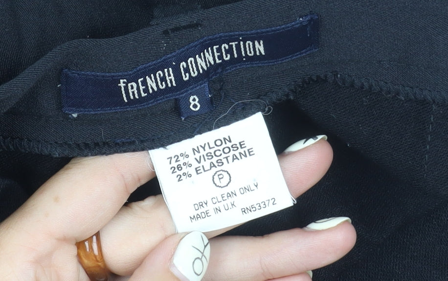 Close-up detail of French Connection Women's Black Ankle Trousers, size 8