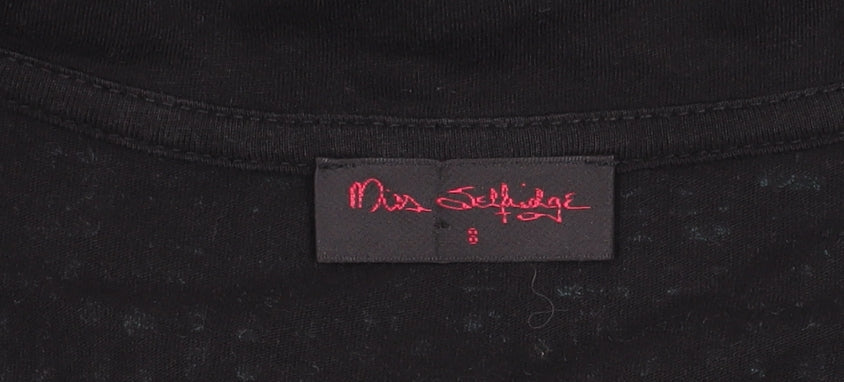 Brand and care label for Miss Selfridge Women’s Black Floral Fit & Flare Dress, size UK 8