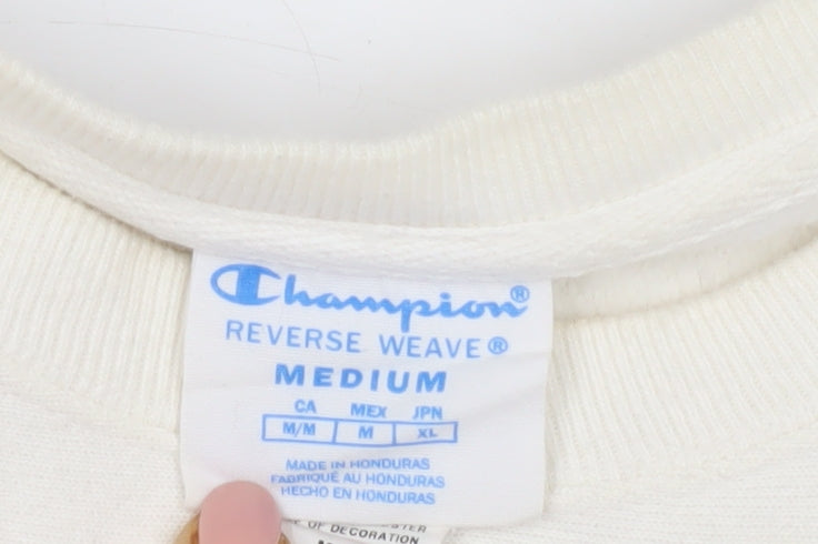 Close-up detail of Champion Ivory Crew Neck Sweatshirt M unisex adults