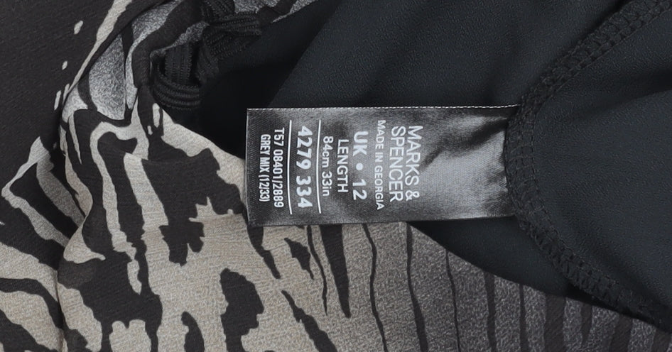 Marks and Spencer Women's Black Flare Skirt - Size 12