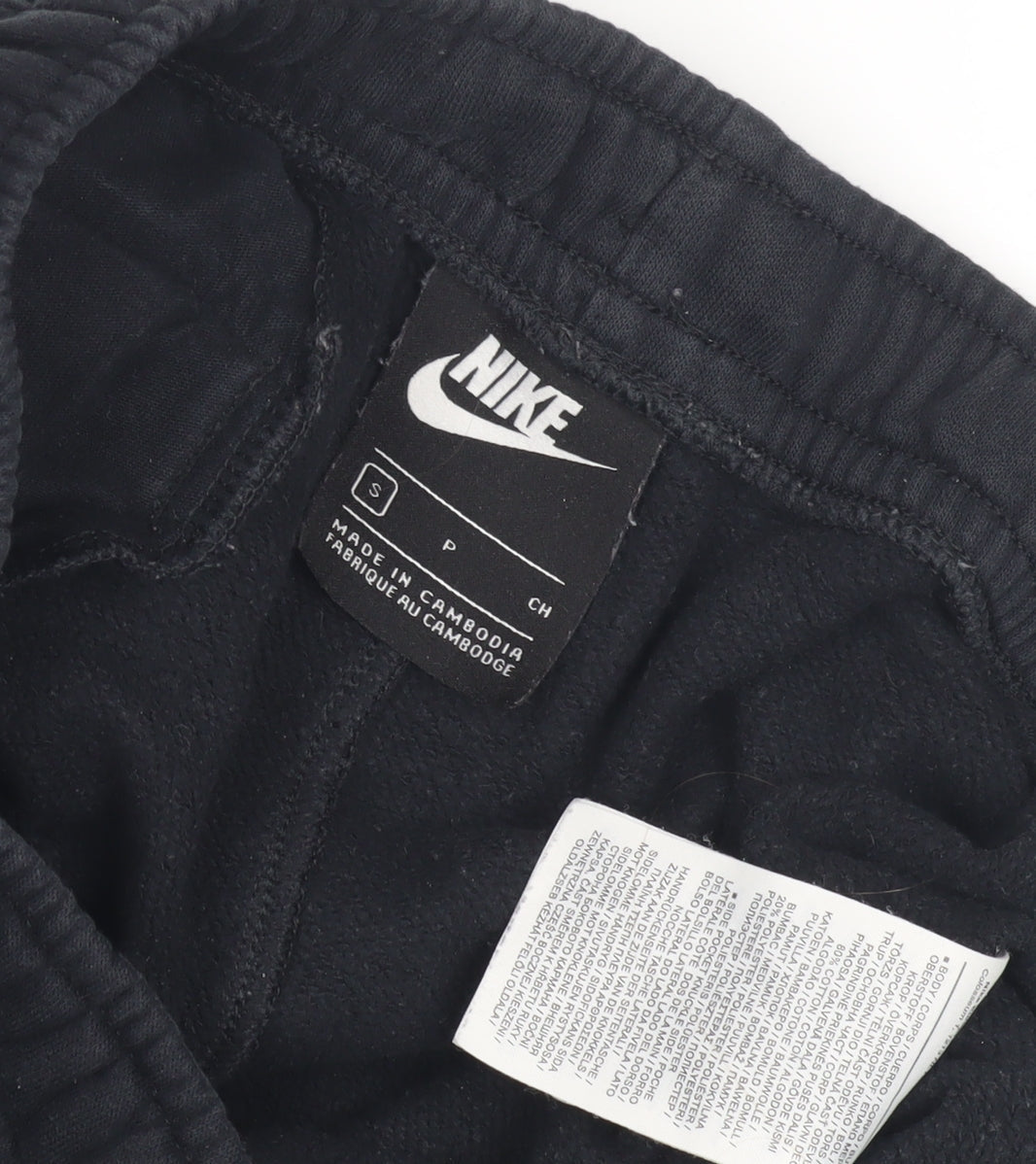 Close-up detail of Nike unisex black jogger trousers s sports