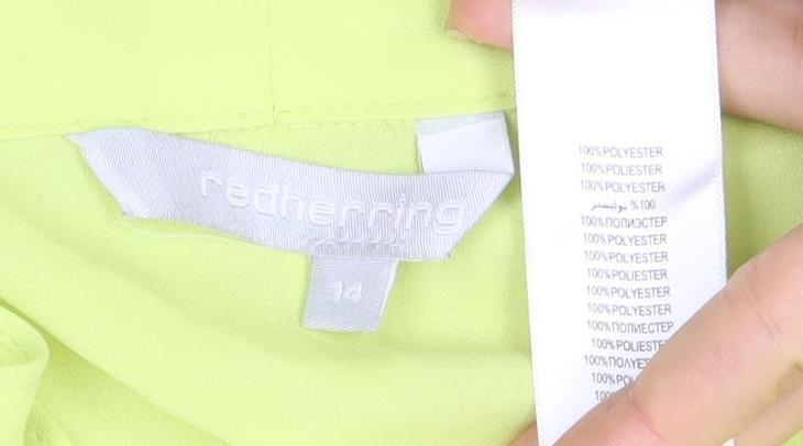 Close-up detail of Red Herring Women's Yellow Wrap Blouse, size 14