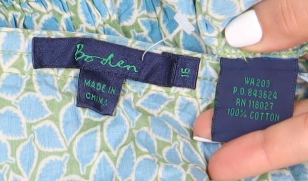 Close-up detail of J.Crew Women's Blue Floral Wrap Blouse, size 12