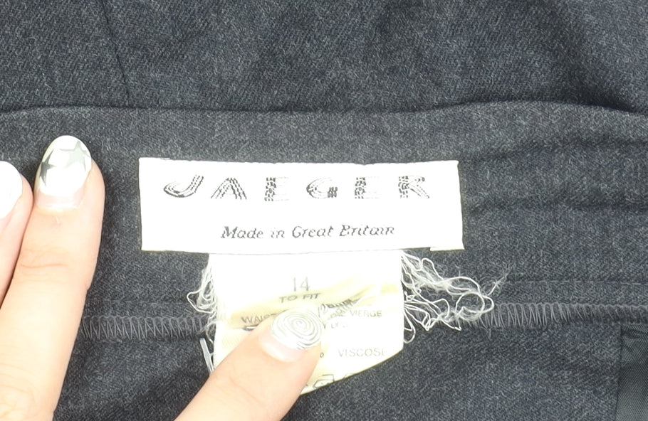 Brand and care label for Jaeger Women's Black Wool Pencil Skirt, size 14