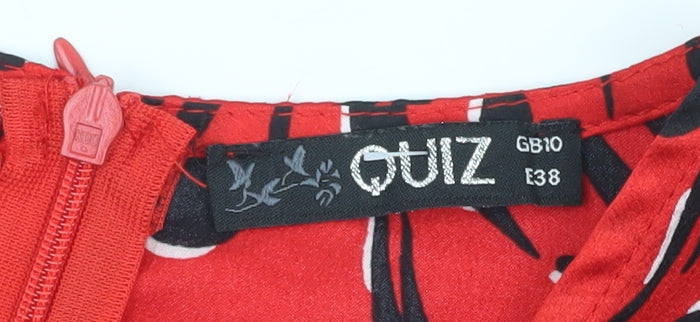 Close-up detail of Quiz Women's Red Animal Print Dress, size 10